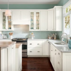 Timberlake Cabinetry Style: Tucson Material: Maple Painted: Linen with Beadboard Center Panel